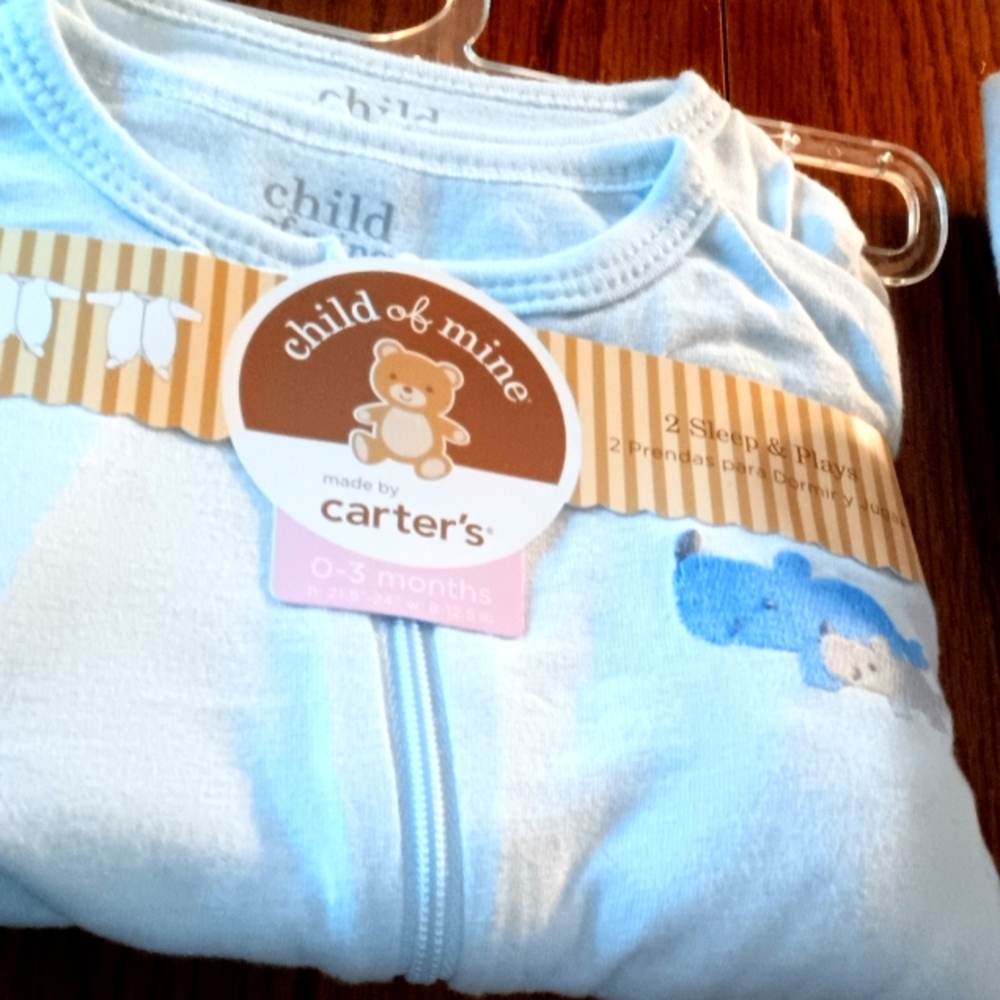 Made by Carter's child of mine to sleep and plays baby clothes